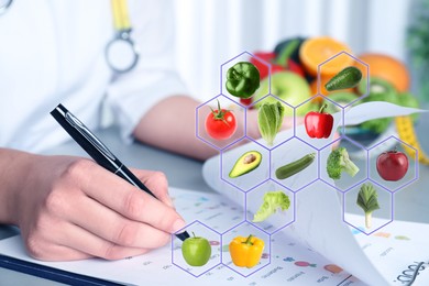 Image of Nutritionist working at table in office and images of different vegetables and fruits. Healthy eating