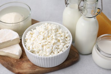 Photo of Different fresh dairy products on light table