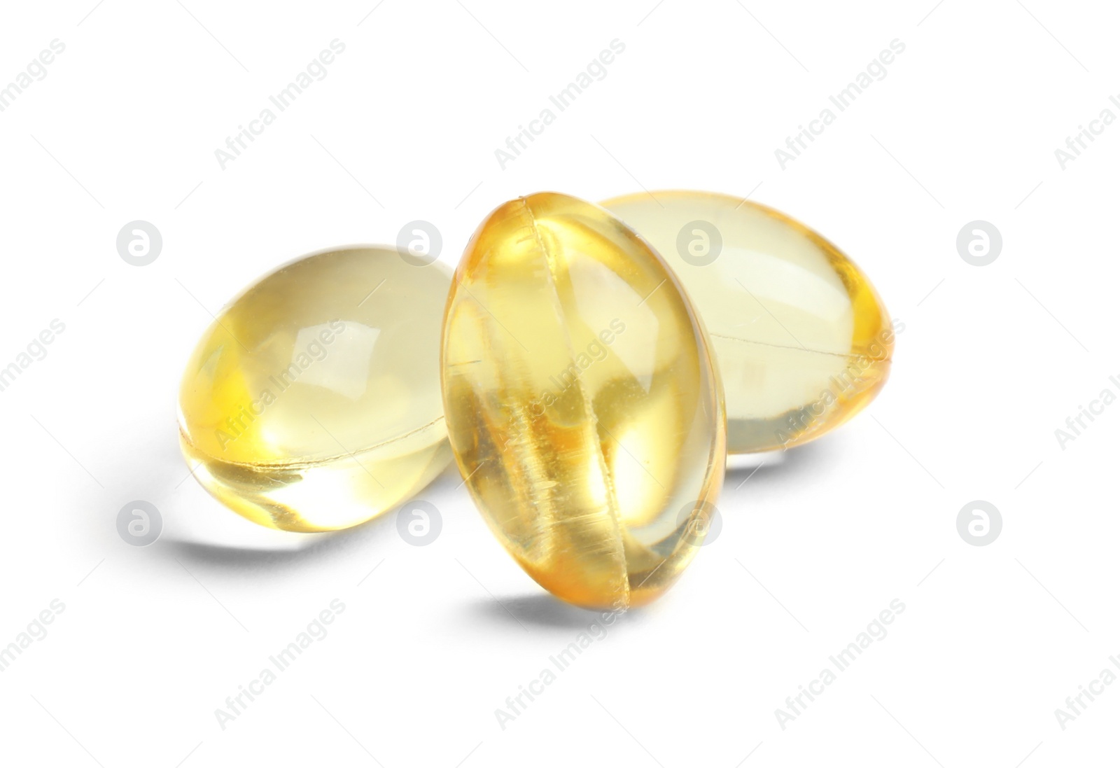 Photo of Cod liver oil pills on white background