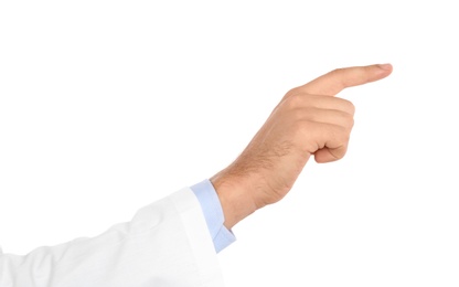 Male doctor pointing on white background, closeup