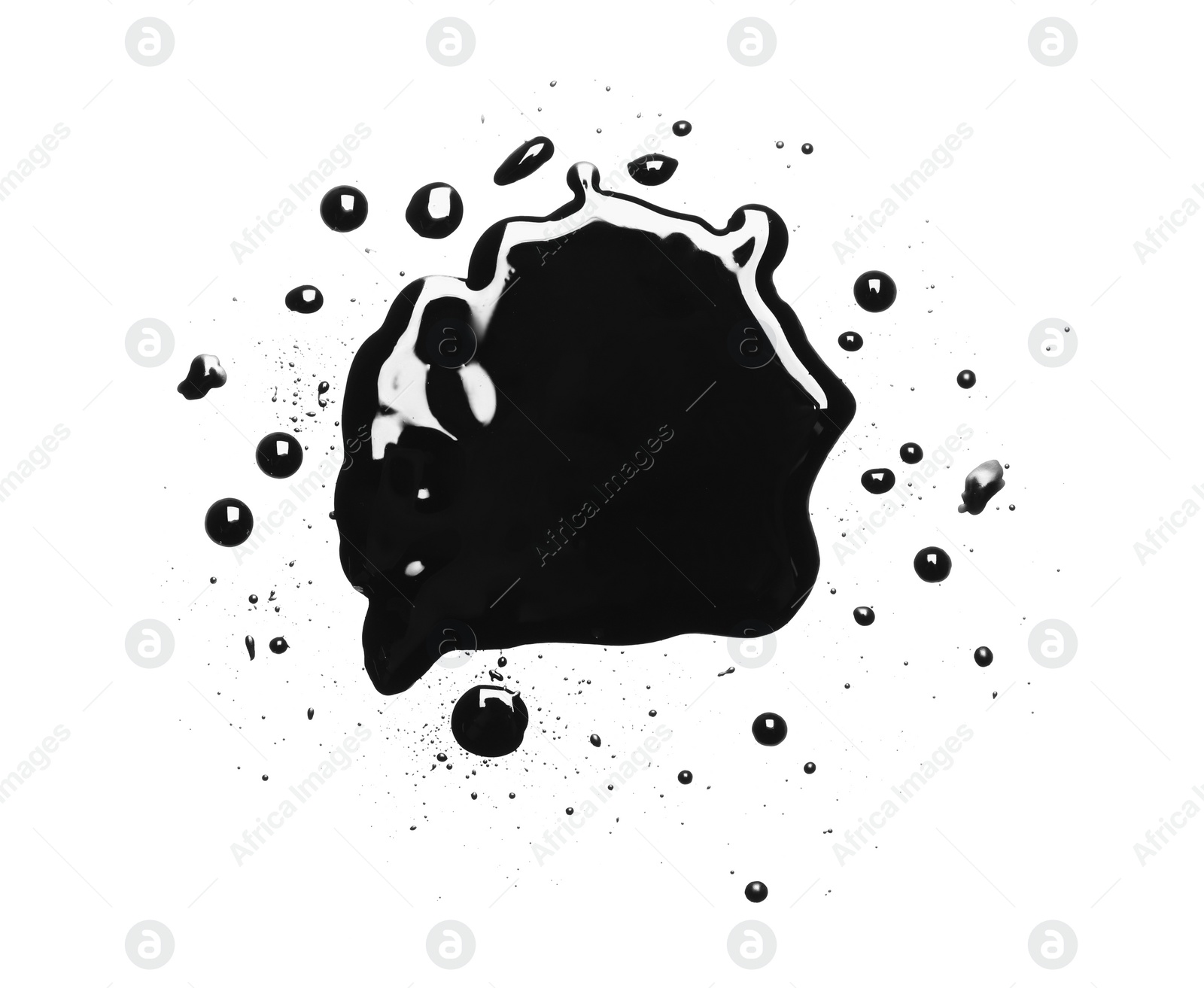 Photo of Blots of black paint on white background, top view