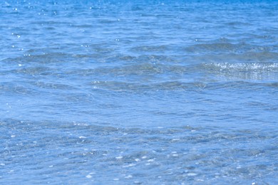 Photo of Beautiful sea water surface with waves on sunny day