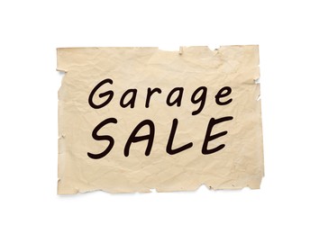 Sheet of crumpled paper with words Garage Sale isolated on white, top view