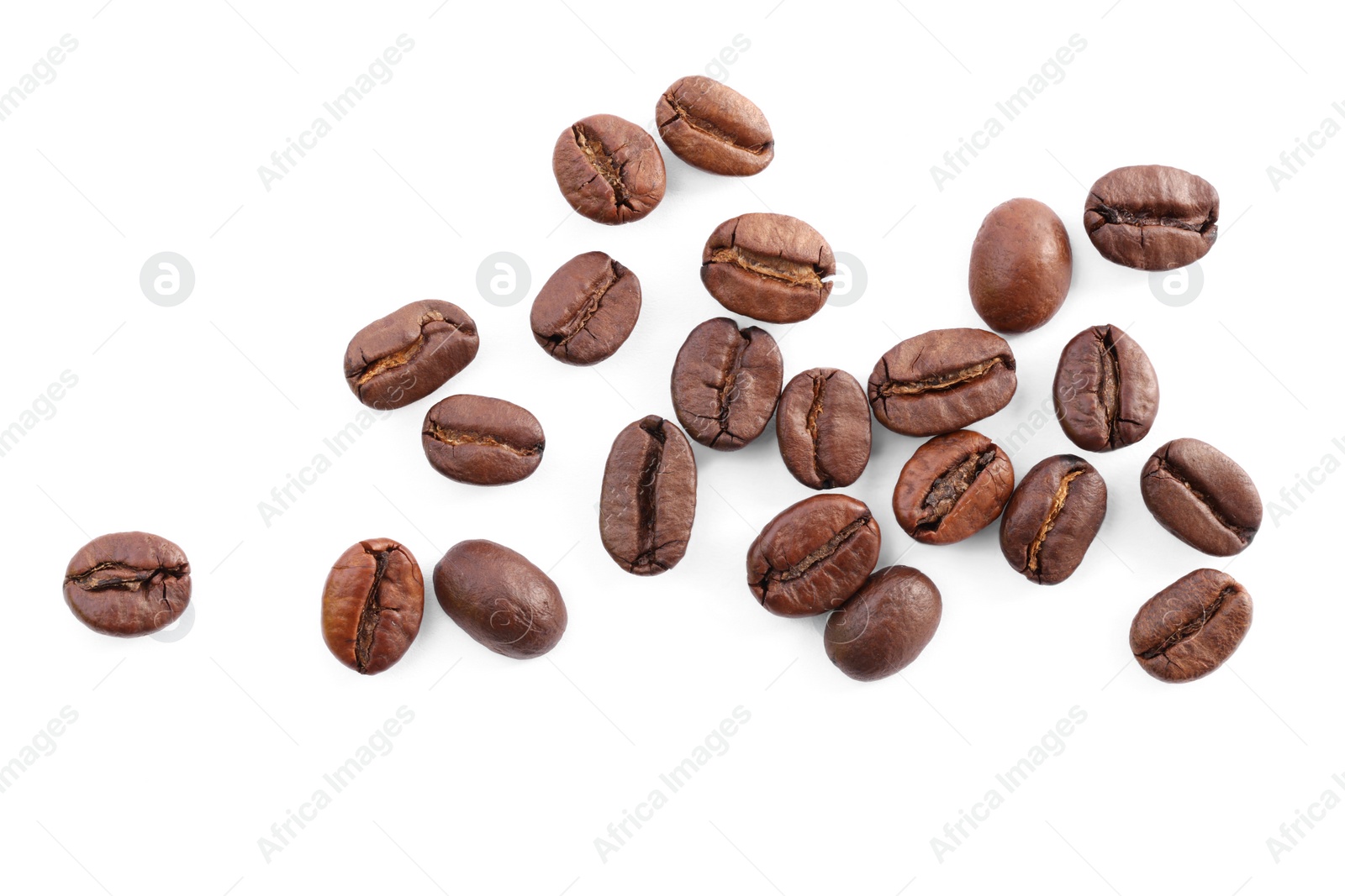 Photo of Many roasted coffee beans isolated on white, top view