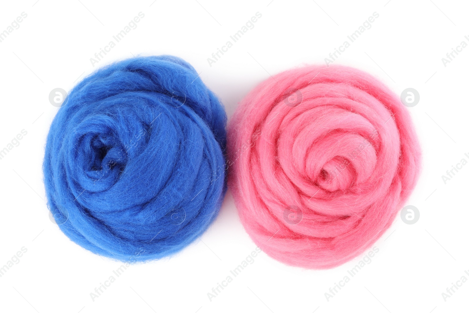Photo of Blue and pink felting wool isolated on white, top view