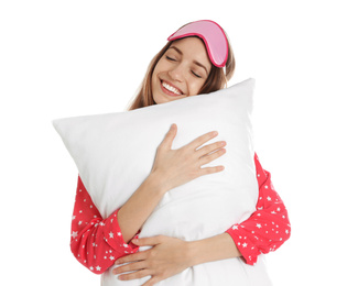 Beautiful woman with pillow and sleep mask on white background. Bedtime