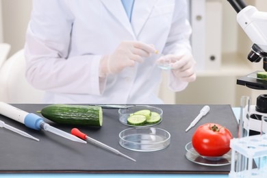 Photo of Quality control. Food inspector working in laboratory, closeup