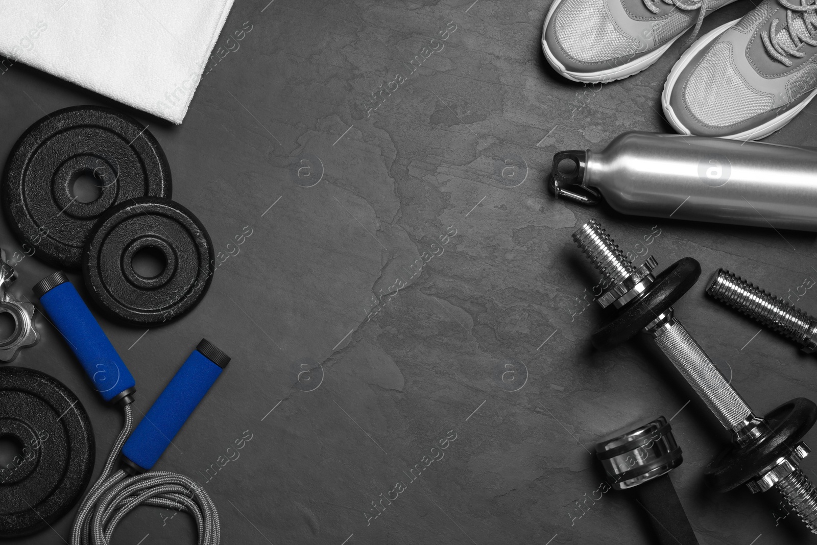 Gym equipment on black background, flat lay. Space for text Photo of Gym equipment on black background, flat lay. Space for text