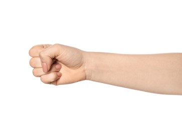 Photo of Playing rock, paper and scissors. Woman showing fist on white background, closeup