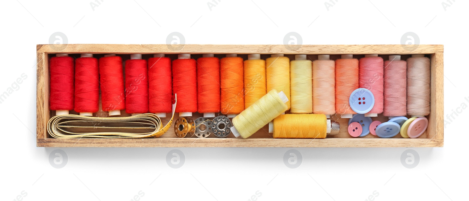 Photo of Container with set of color sewing threads on white background