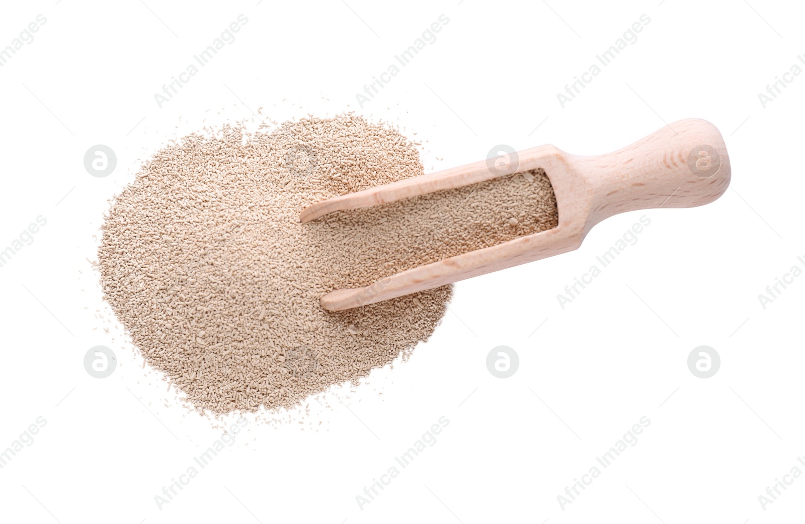 Photo of Wooden scoop with active dry yeast isolated on white, top view