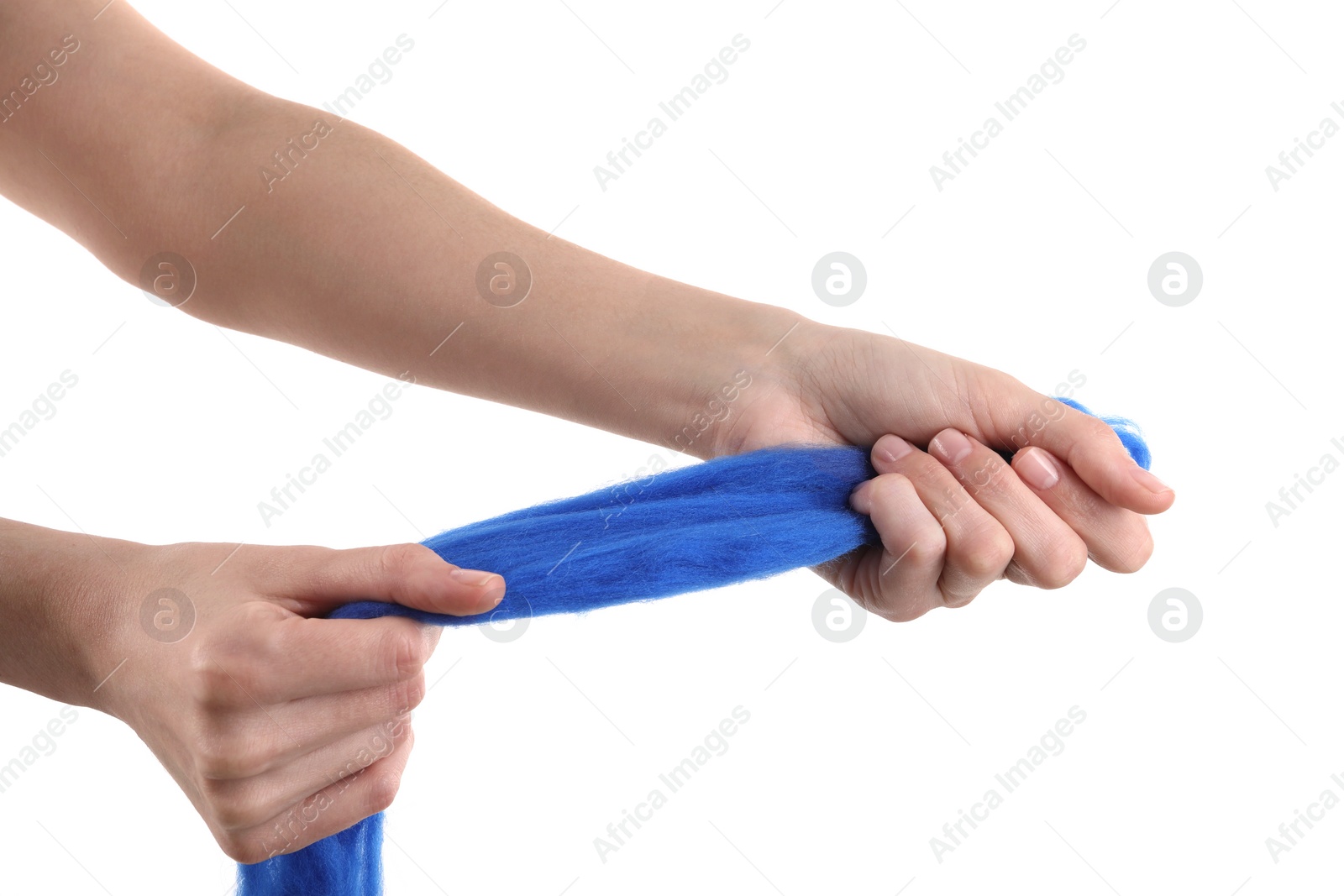 Photo of Woman holding blue felting wool on white background, closeup