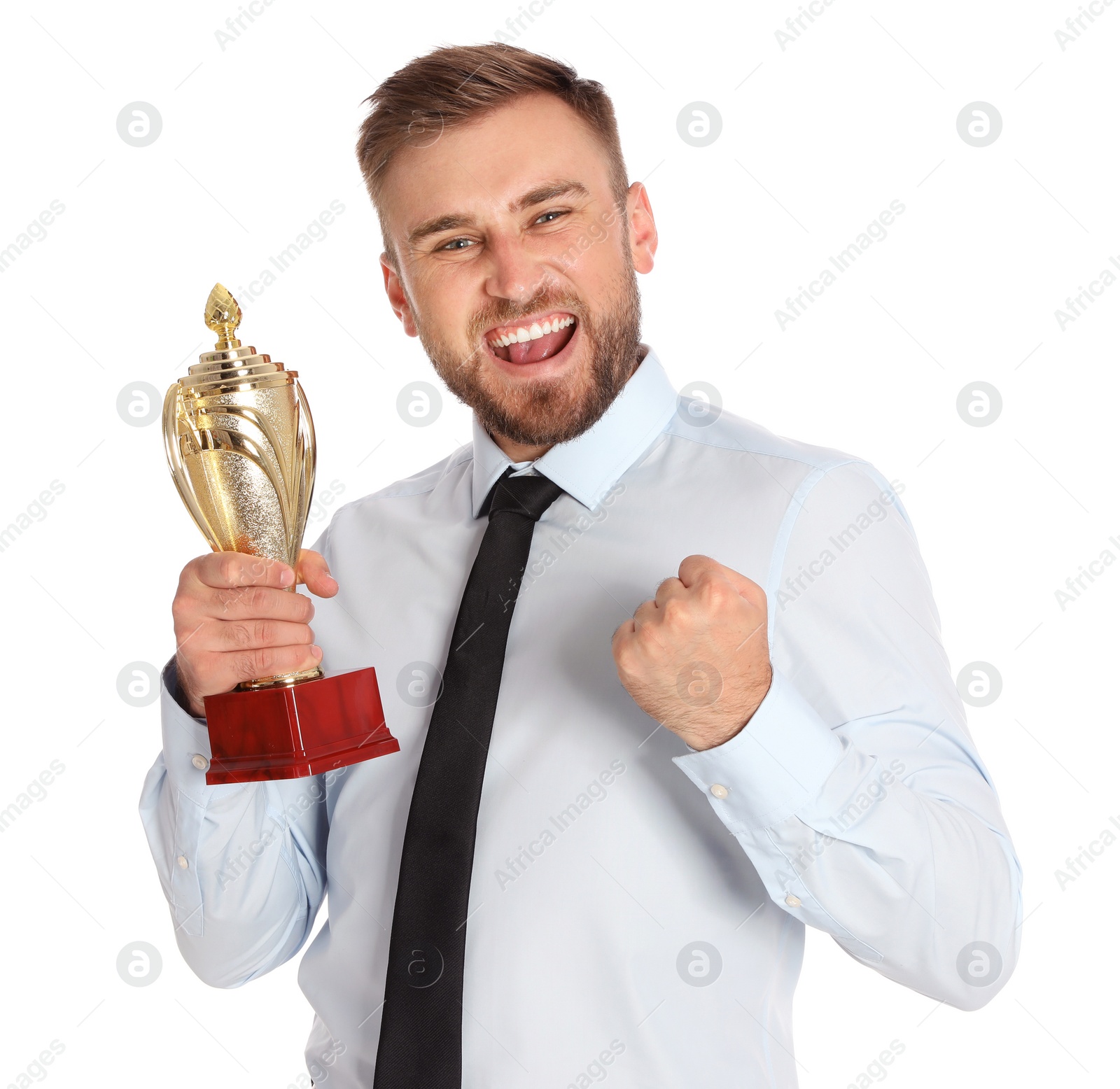 Photo of Portrait of happy young businessman with gold trophy cup on white background