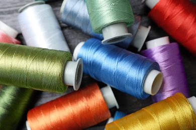 Photo of Different sewing threads as background