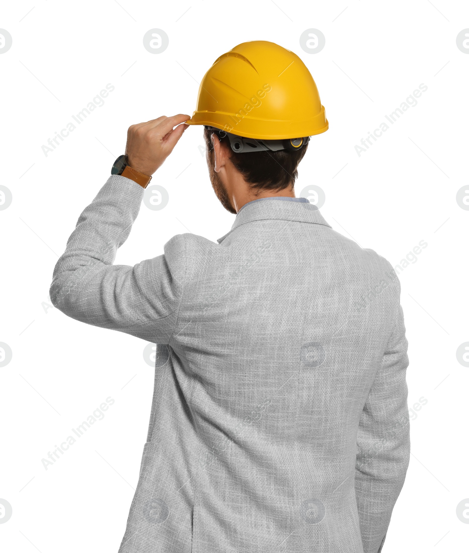 Photo of Professional engineer in hard hat isolated on white, back view