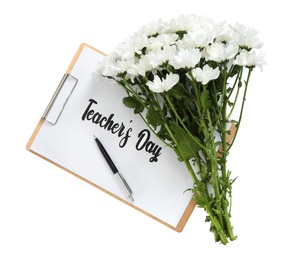 Photo of Beautiful flowers and clipboard with words TEACHER'S DAY on white background, top view