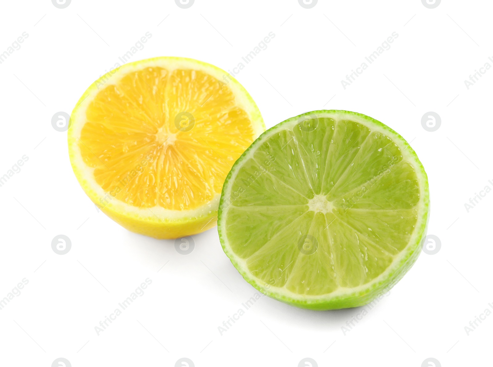 Photo of Halves of fresh ripe lemon and lime on white background