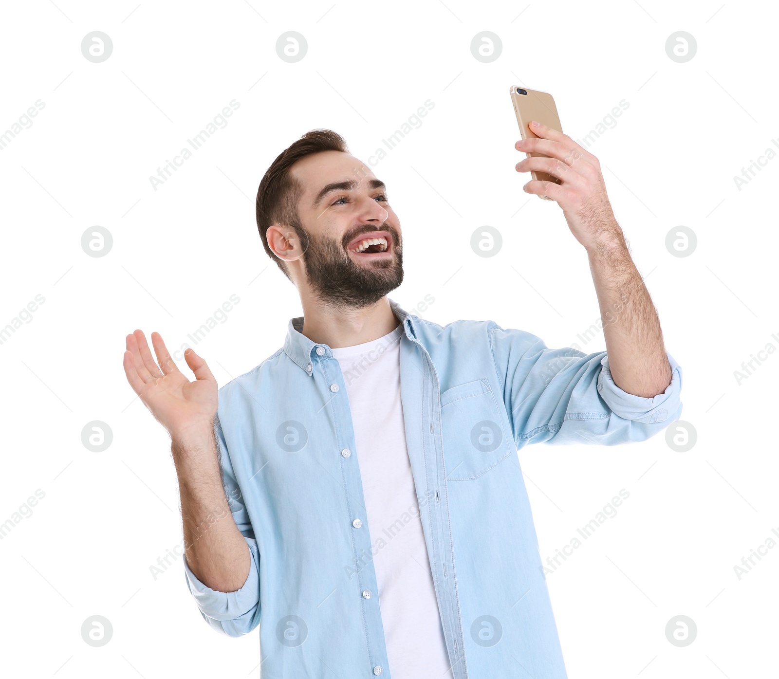 Photo of Man using mobile phone for video chat isolated on white