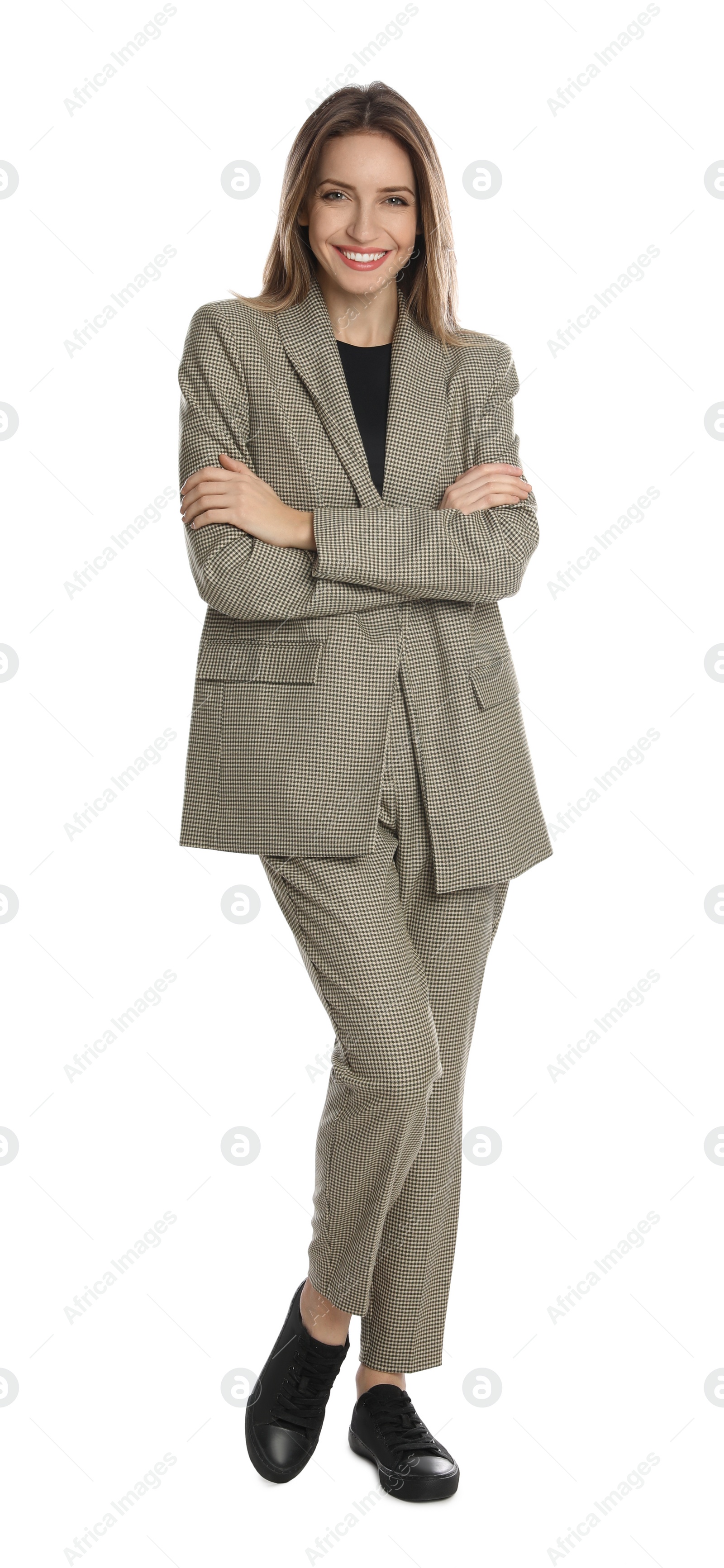 Photo of Full length portrait of beautiful young woman in fashionable suit on white background. Business attire