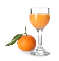 Photo of Tasty tangerine liqueur in glass and fresh fruit isolated on white