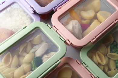 Photo of Plastic boxes with prepared meal on table