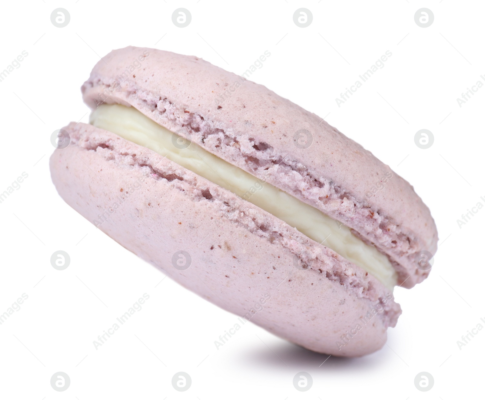 Photo of Violet macaron isolated on white. Delicious dessert