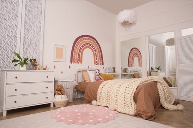 Stylish room with comfortable bed for kids. Interior design