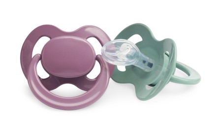 New different baby pacifiers on white background