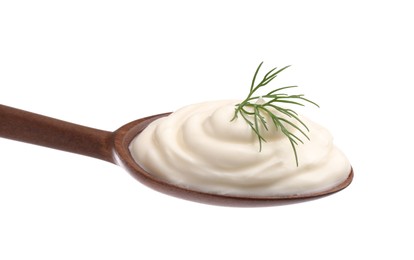 Delicious sour cream with dill in wooden spoon on white background