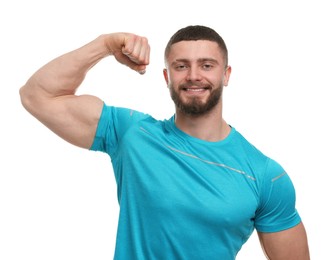 Photo of Handsome man showing muscles on white background
