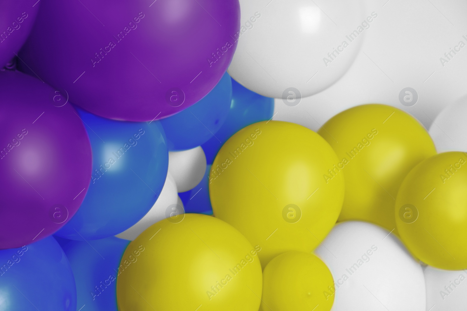 Image of Balloons in different colors as background, closeup