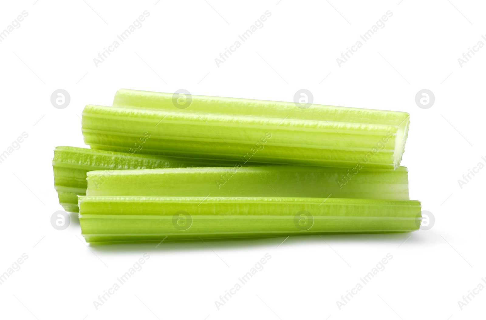 Photo of Fresh green cut celery isolated on white