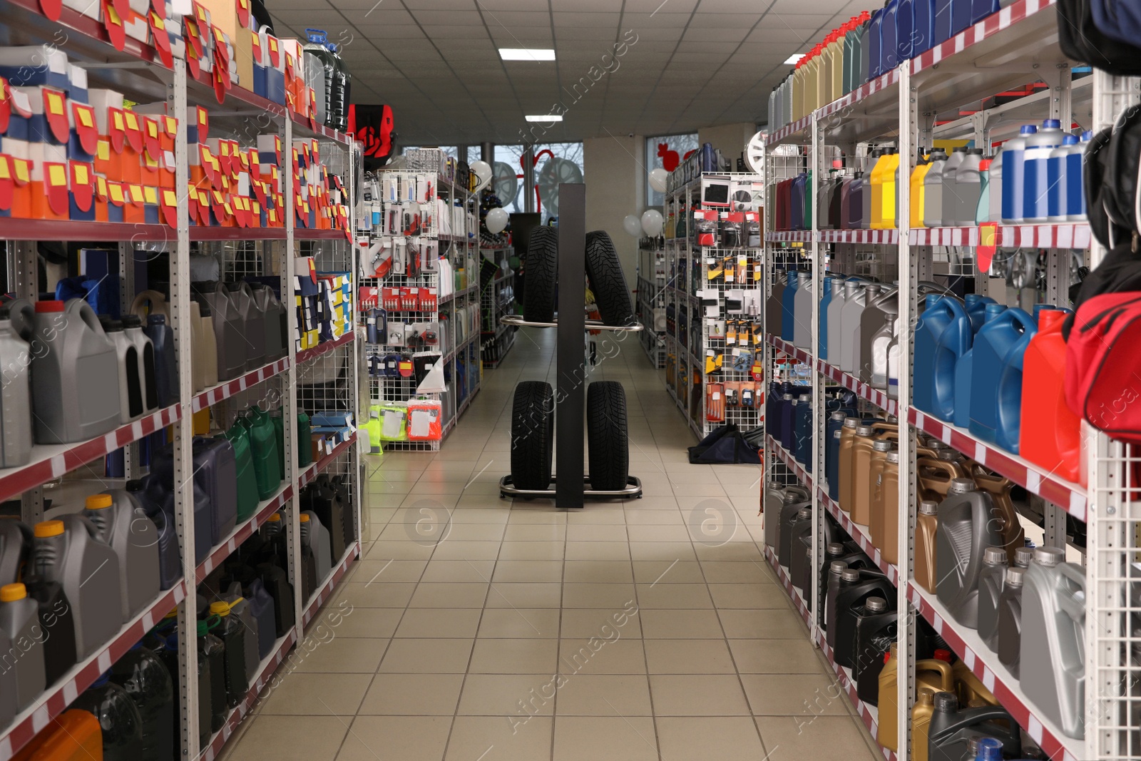 Image of Tires and car care products in auto store