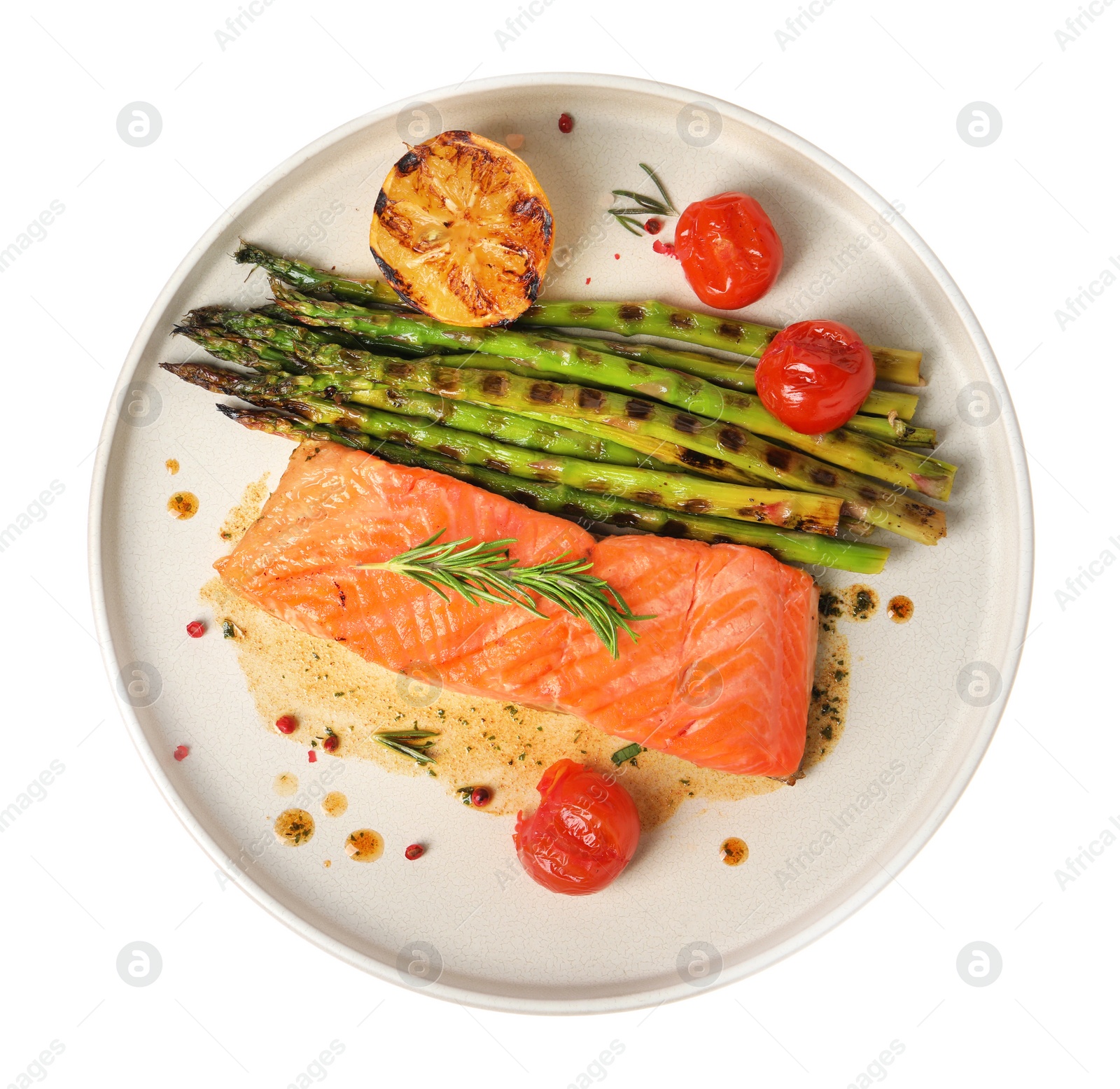 Photo of Tasty grilled salmon with tomatoes, asparagus and spices isolated on white, top view