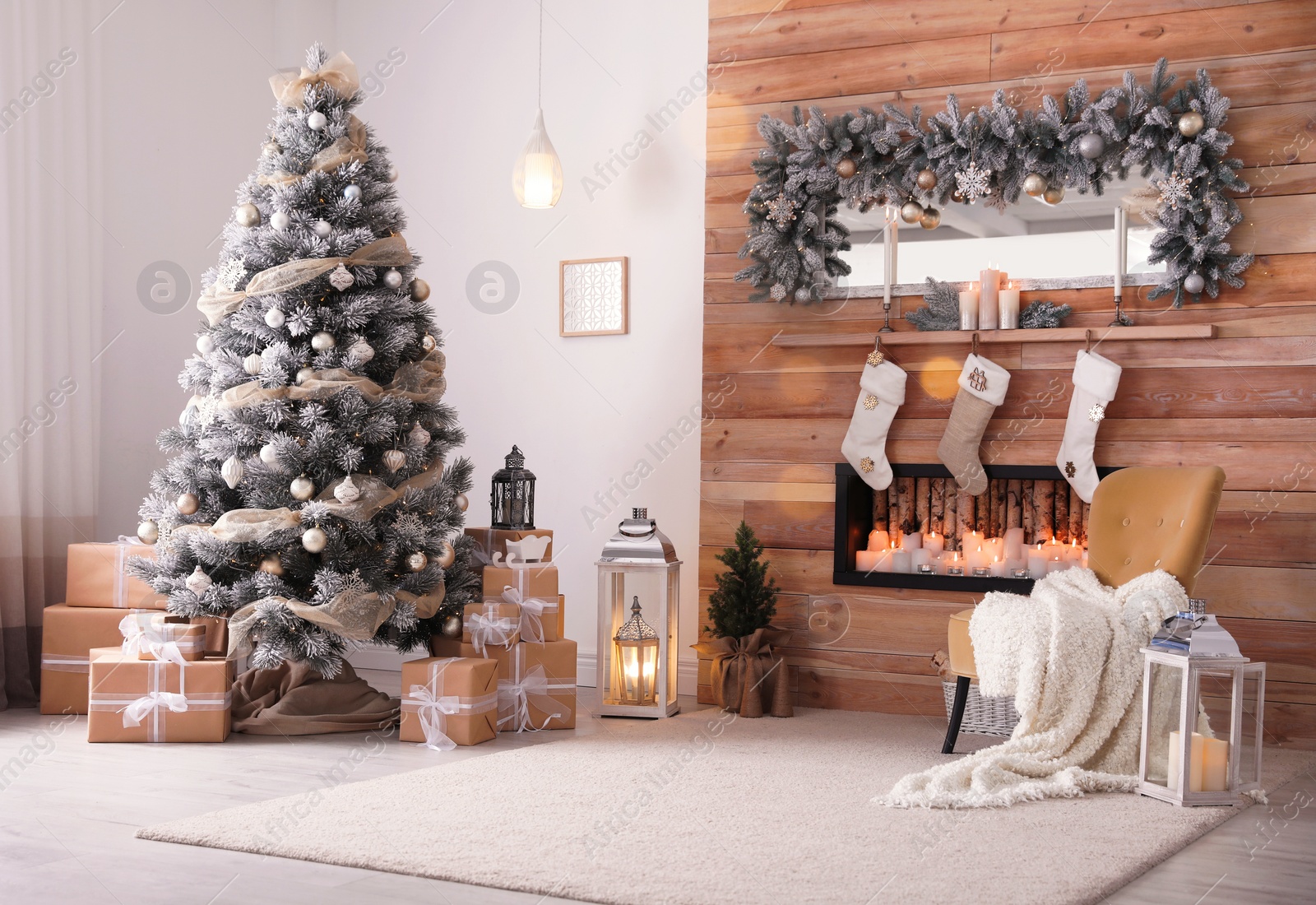 Photo of Festive interior with decorated Christmas tree and fireplace