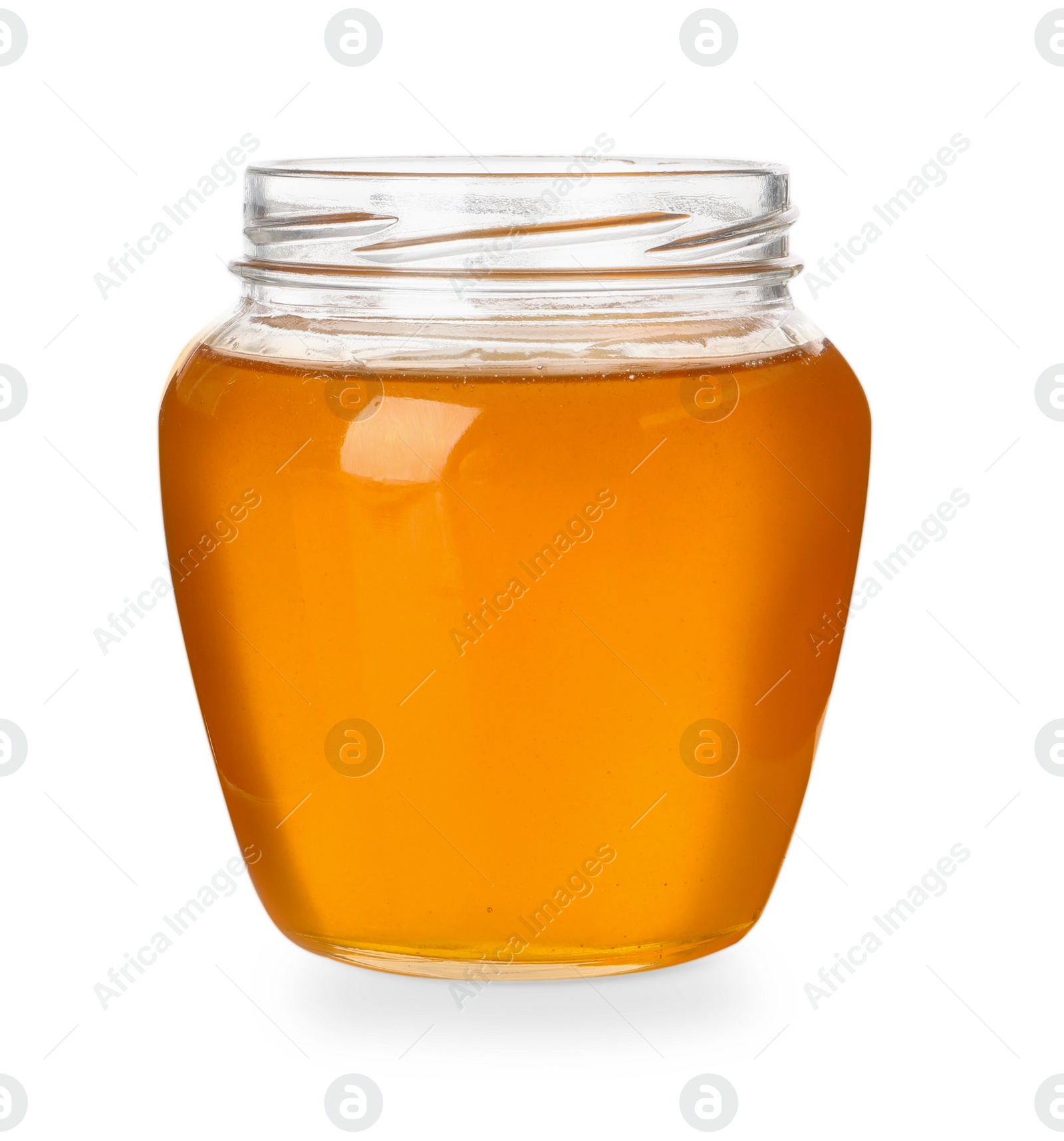 Photo of Tasty honey in glass jar isolated on white