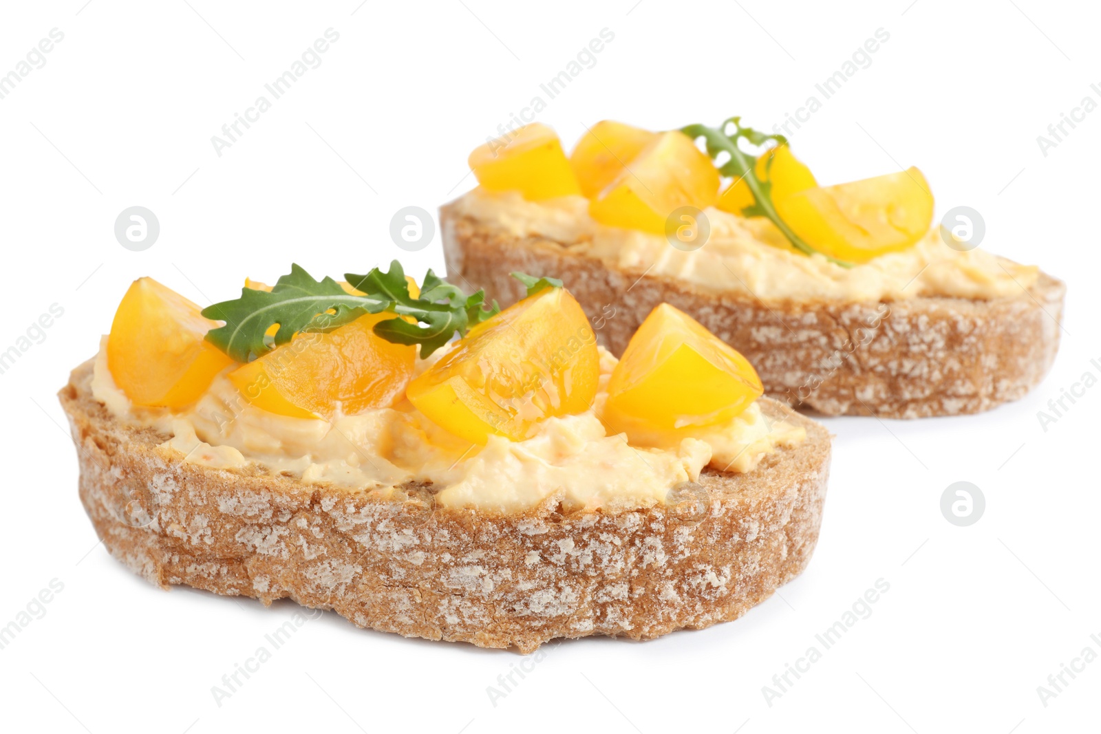 Photo of Tasty fresh tomato bruschettas on white background