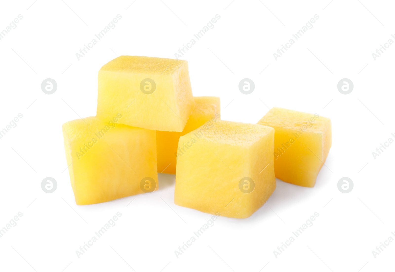 Photo of Tasty ripe mango cubes isolated on white