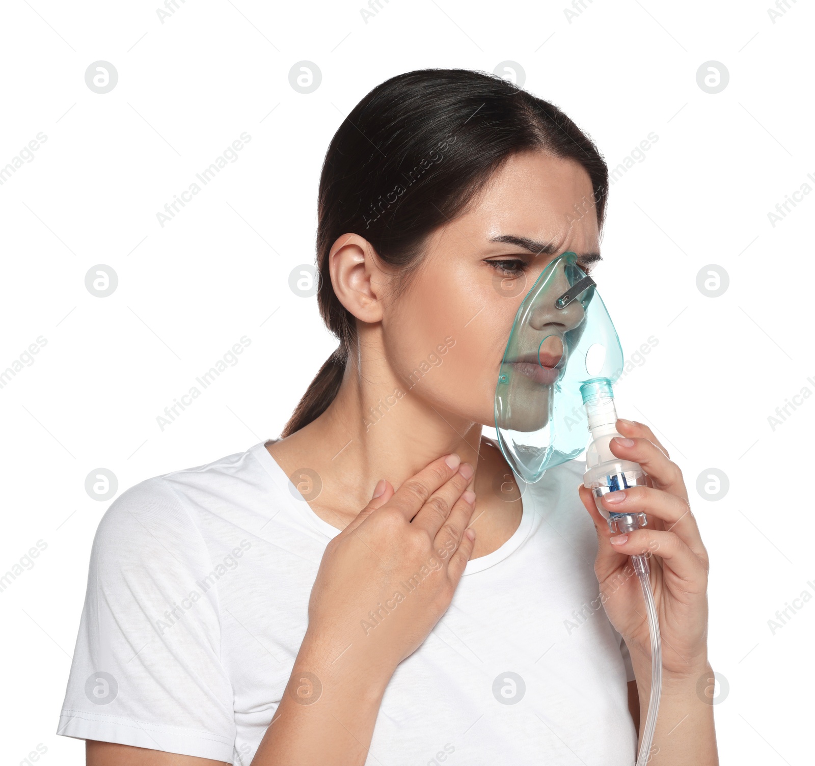 Photo of Young woman using nebulizer on white background