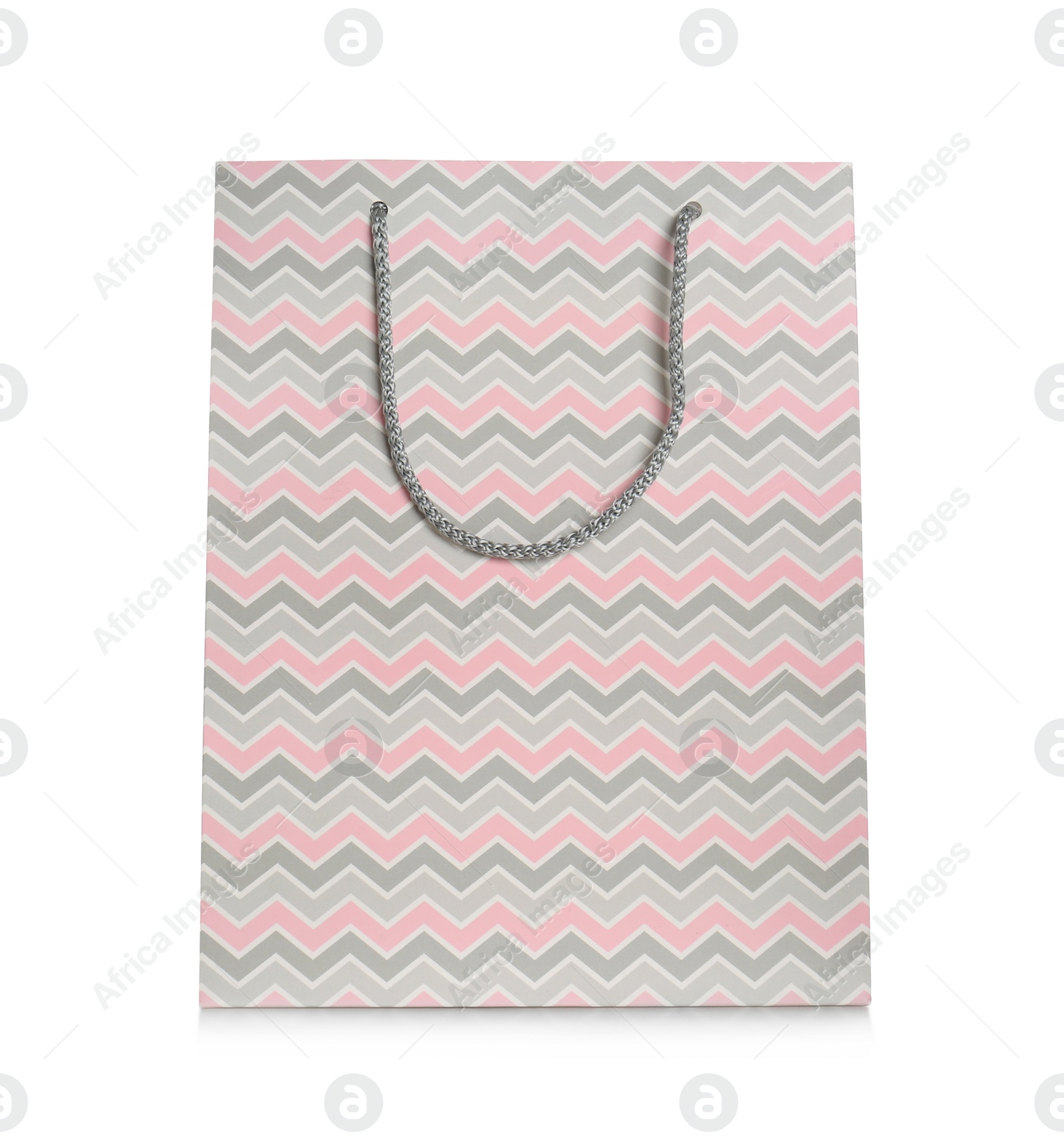 Photo of Stylish gift paper bag isolated on white