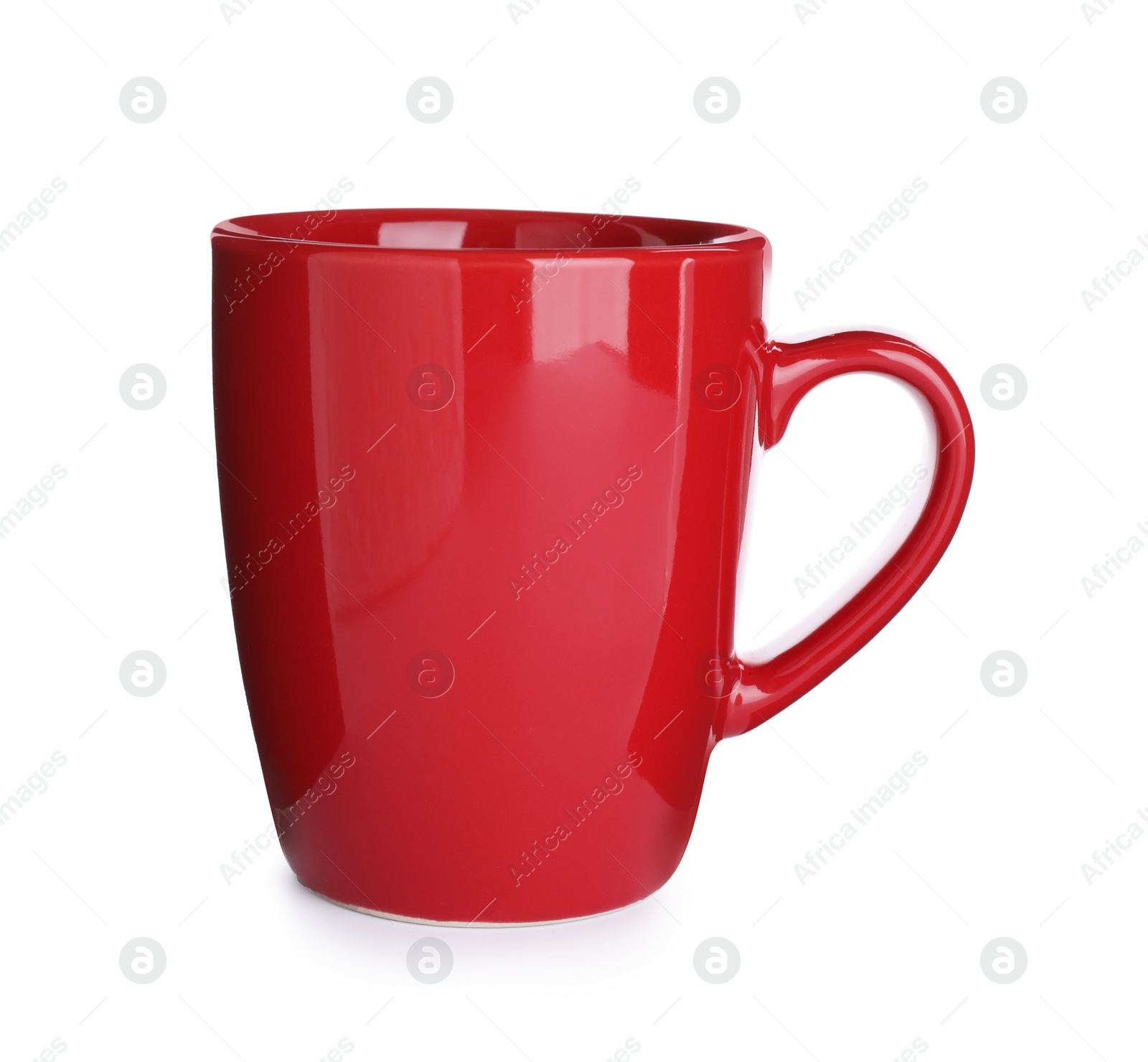 Photo of New red ceramic cup isolated on white