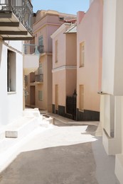 Photo of City street with beautiful buildings on sunny day