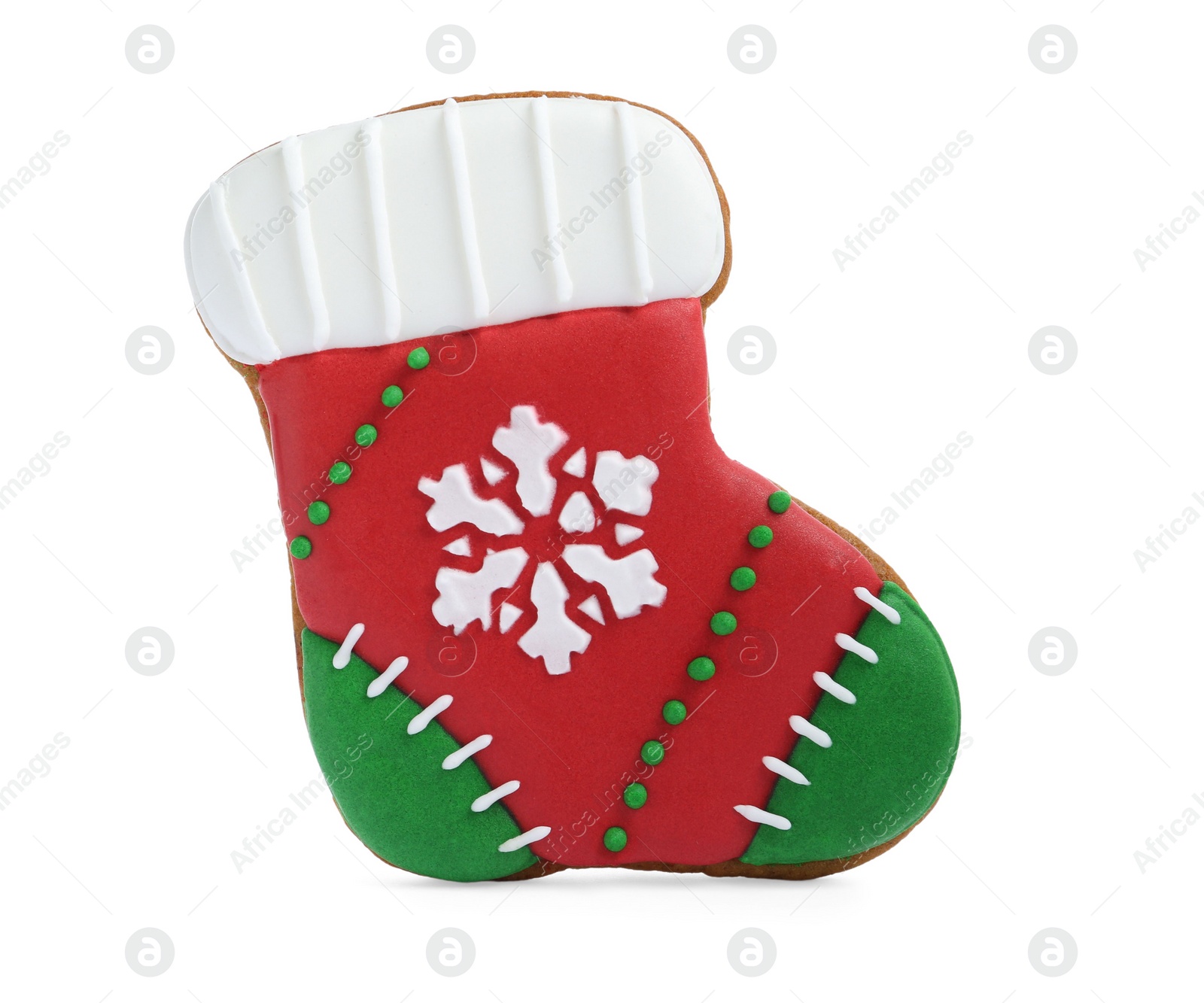 Photo of Christmas cookie in shape of stocking isolated on white