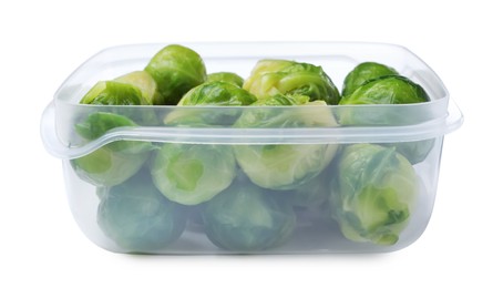 Photo of Brussels sprouts in plastic container isolated on white