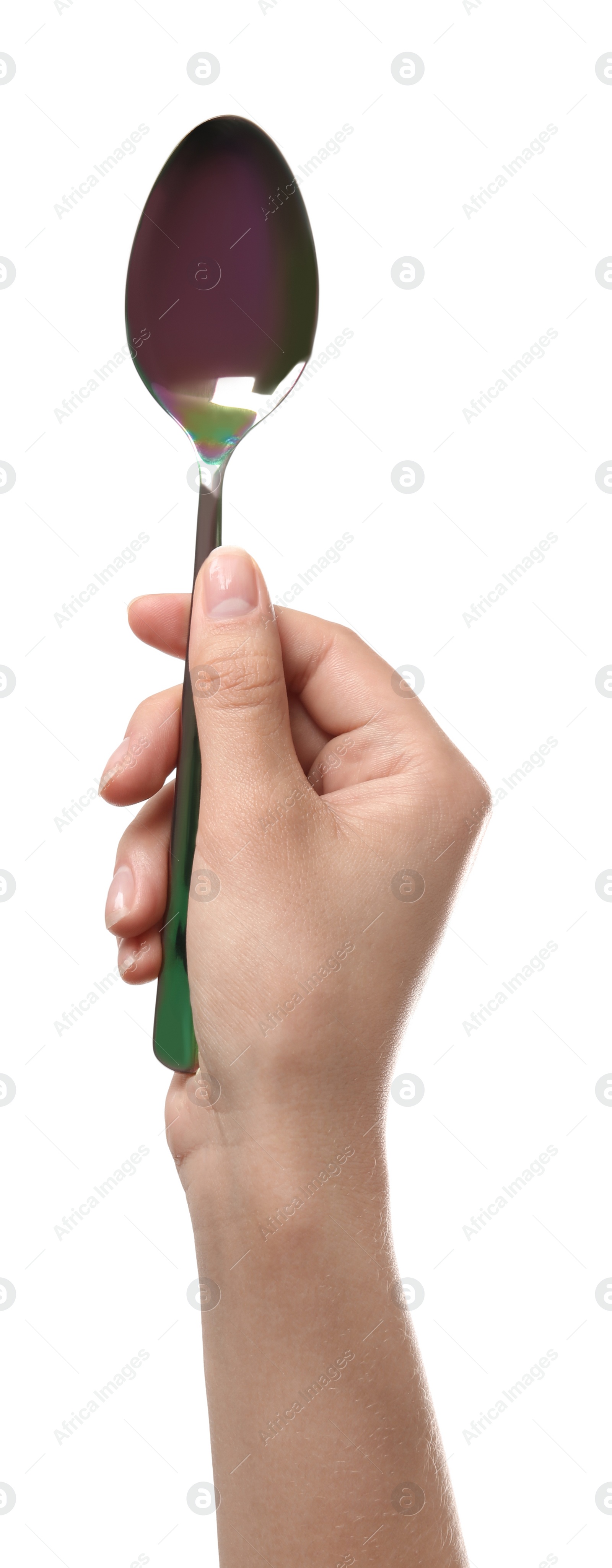 Photo of Woman holding clean tablespoon on white background, closeup