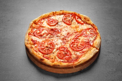 Photo of Hot cheese pizza Margherita on grey background