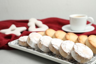 Photo of Tasty homemade cookies on light grey table, closeup