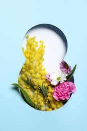 Photo of 8 March greeting card design with flowers, top view. Happy International Women's Day
