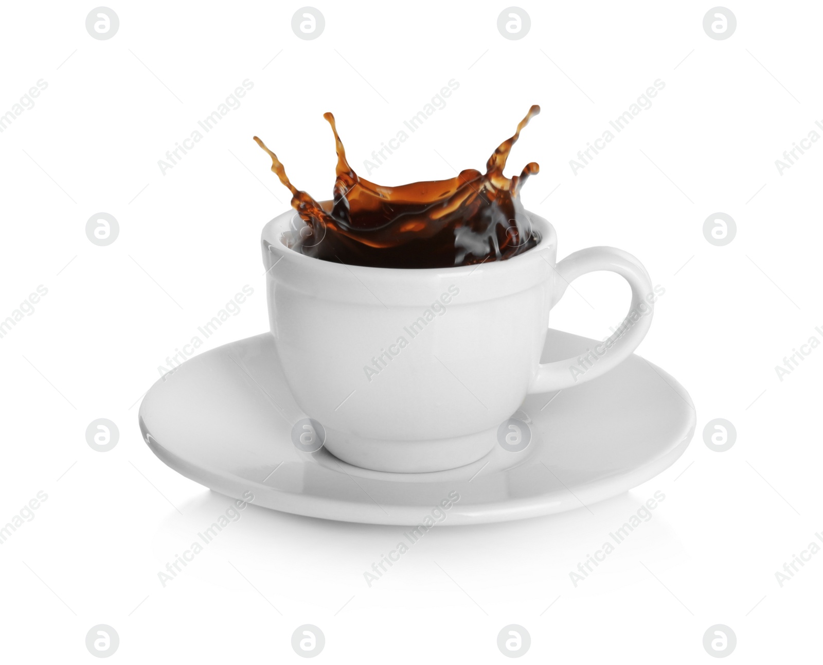 Photo of Coffee splashing out of cup on white background