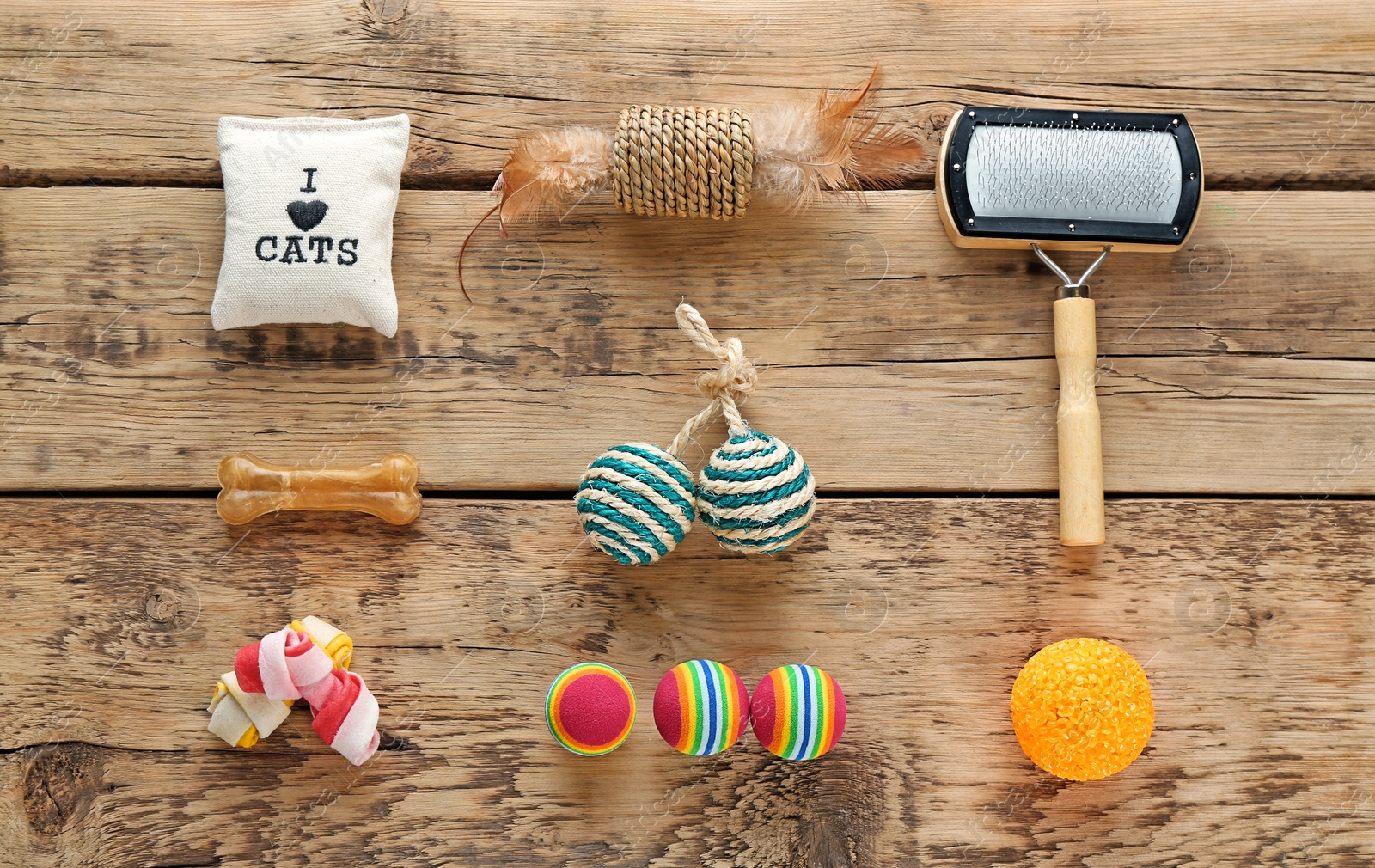 Photo of Cat's accessories on wooden background